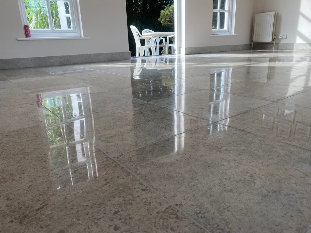 Perfectly polished limestone floor in a private property in Clapham, professionally restored to high-gloss finish by our specialist team.