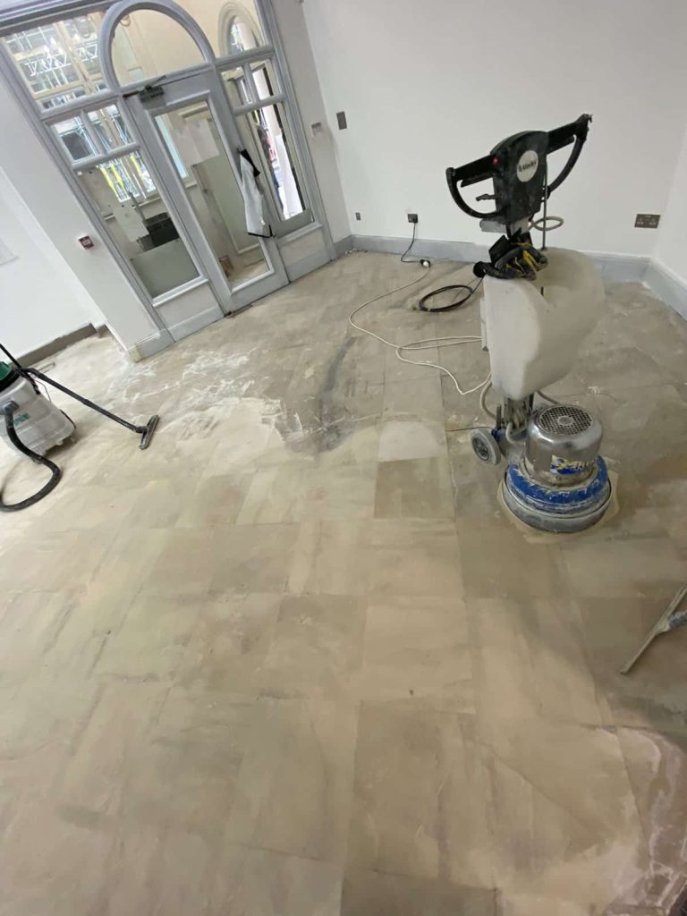 Limestone floor grinding in progress – our specialist team using professional diamond equipment on a limestone floor in London.
